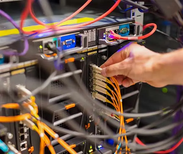 Data center technician managing dark fiber network in Dubai